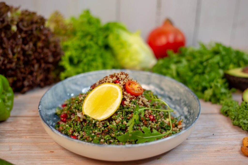 Quinoa salad with lemon, avocado and parsley